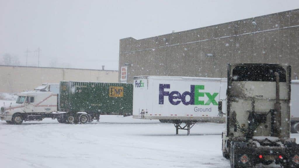 EMP and FedEx trailers in snow