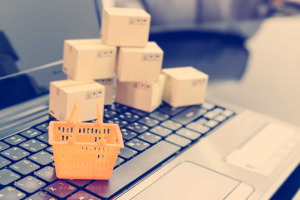 orange-basket-boxes-on-laptop