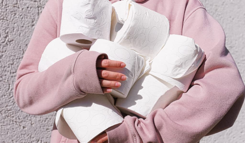 woman-holding-toilet-paper